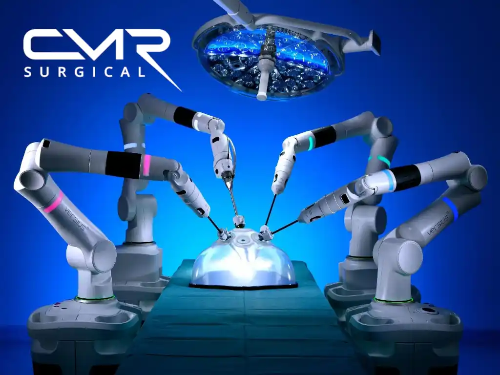 Futuristic CGI operating room with 4 colorful robotic arms around a glowing surgical bed.